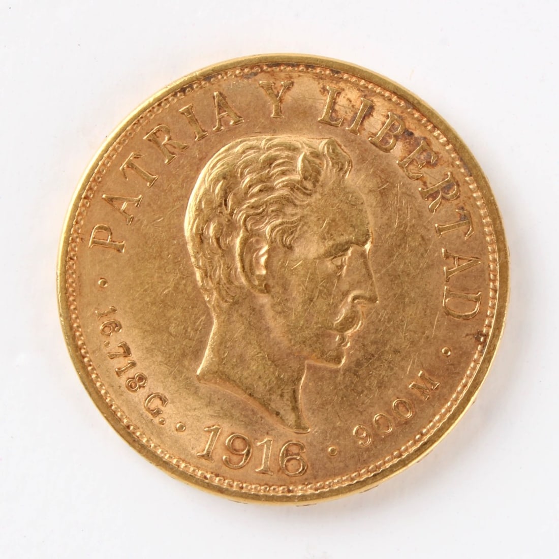 1916 Diez Pesos Gold Coin: 1916 Mexican Diez Pesos .900 Fine Gold Coin. Kodner Galleries offers phone and absentee bidding at a low, flat 21% buyer?s premium without surcharge or hidden fees. For information, please contact the