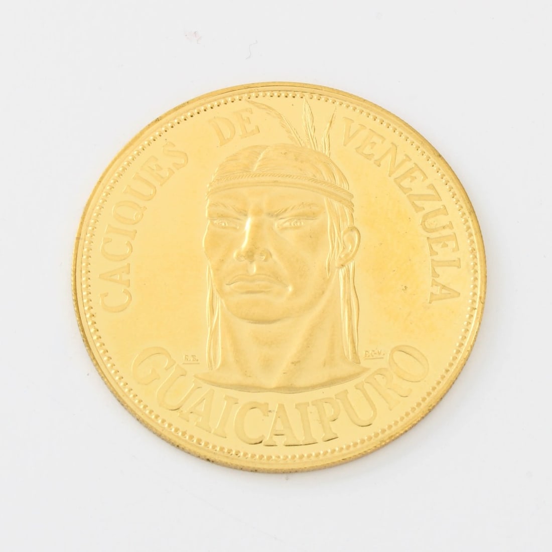Caciques de Venezuela Guaicaipuro Gold Coin: Venezuelan Caciques de Venezuela Guaicaipuro .900 Fine Gold Coin. Kodner Galleries offers phone and absentee bidding at a low, flat 21% buyer?s premium without surcharge or hidden fees. For