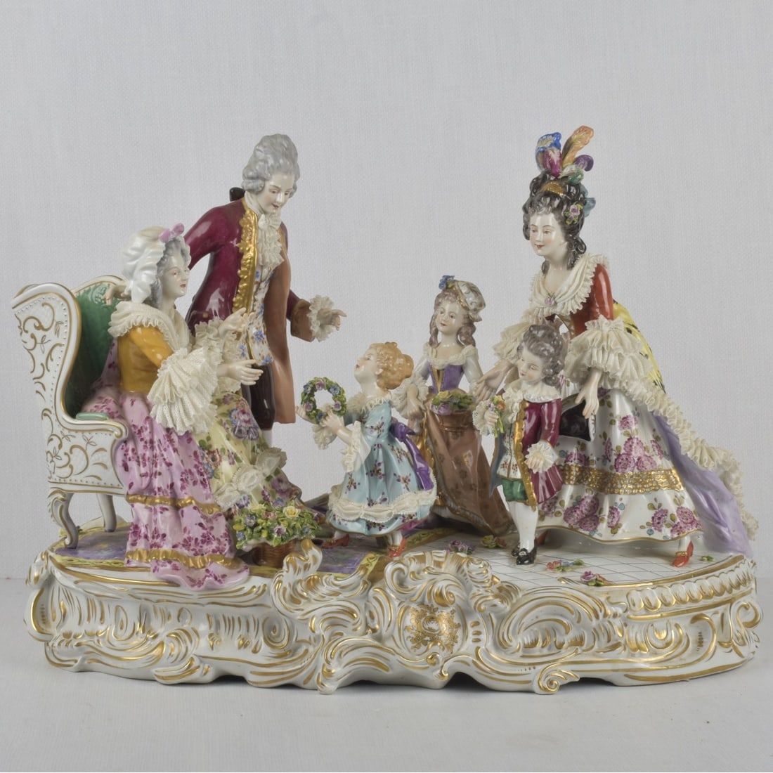 German Rudolstadt Volkstedt: Large Antique Volkstedt Dresden Germany Porcelain Lace Group Figurine Depicting a Rococo-era Happy Family Gathering. 20th century. Properly marked to the top. Measures: 16" high, 22-1/2" wide, 12-1/2"