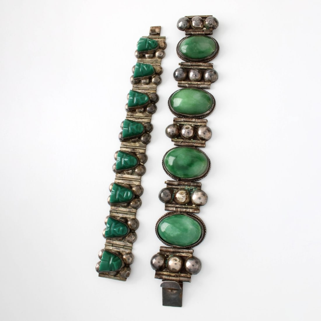 Sterling Silver Bracelets: Two (2) Vintage Mexican Mid-century Sterling Silver Link Bracelets with Green Stone Inlay. Larger signed S.R. Silver Mexico, smaller signed FSS 925 Mexico. Larger measures 7-3/8" L, 1-1/4" W. Approx. 