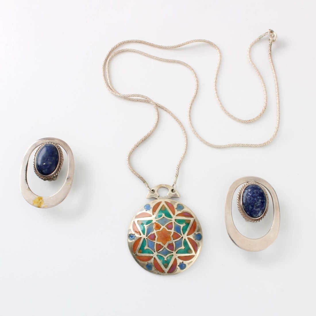 Sterling Silver Jewelry: Vintage Sterling Silver Jewelry. To include Judaica enamel and silver pendant necklace and a pair of Mexican lapis lazuli and sterling silver clip back earrings. All stamped 925. Pendant measures 1-7/