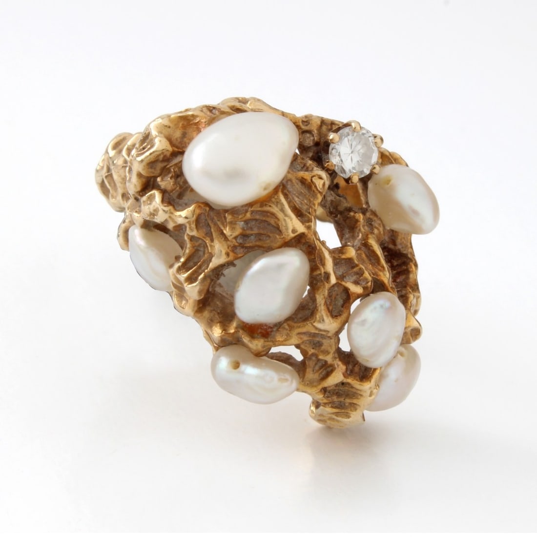 Pearl, Diamond and 14K Ring: Vintage Baroque Pearl, Approx. .12 Carat Round Brilliant Cut Diamond and Free Form 14 Karat Yellow Gold Ring. Ring size 5-1/4. Approx. weight: 11.86 grams. Kodner Galleries offers phone and absentee