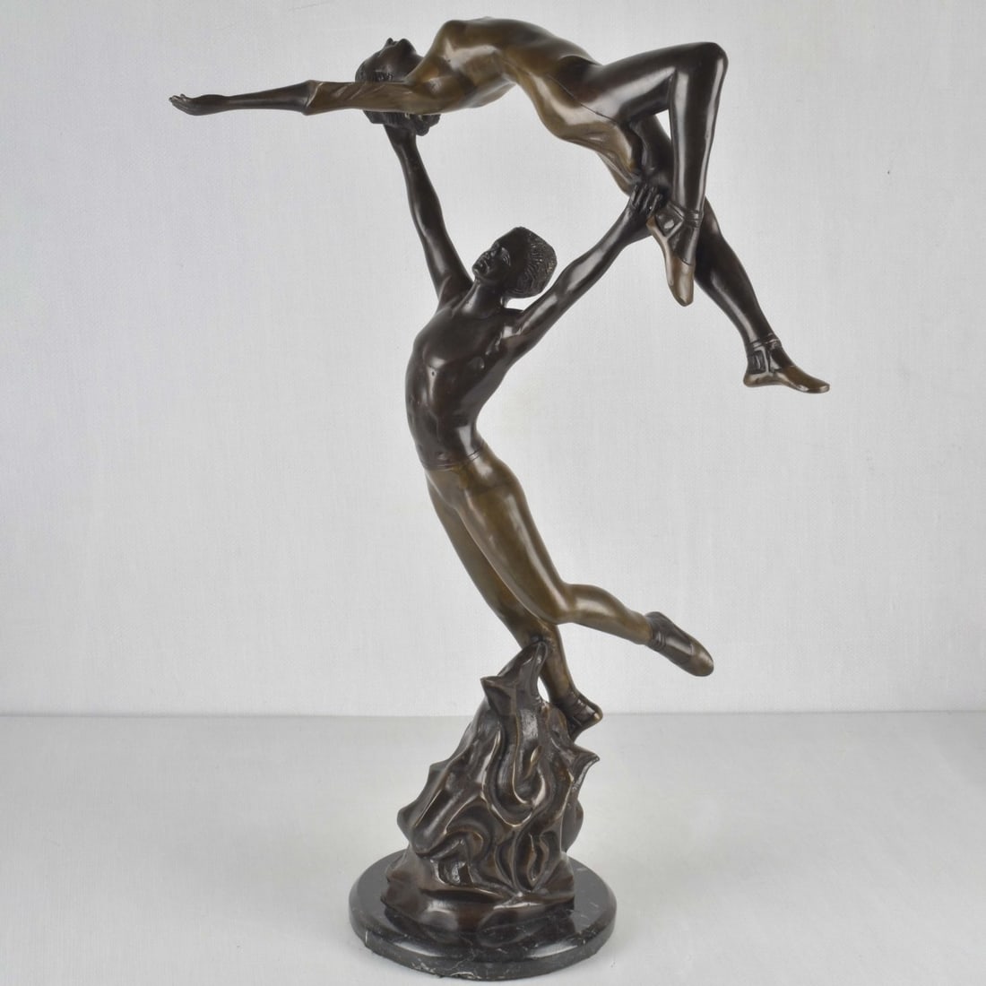 Bronze Dancers Sculpture: Contemporary Dancing Couple Patinated Bronze Sculpture on Marble Base. Appears to be signed 'C J Bronze", numbered 10/30. Measures 25-1/2" H, 20" W. Kodner Galleries offers phone and absentee bidding 