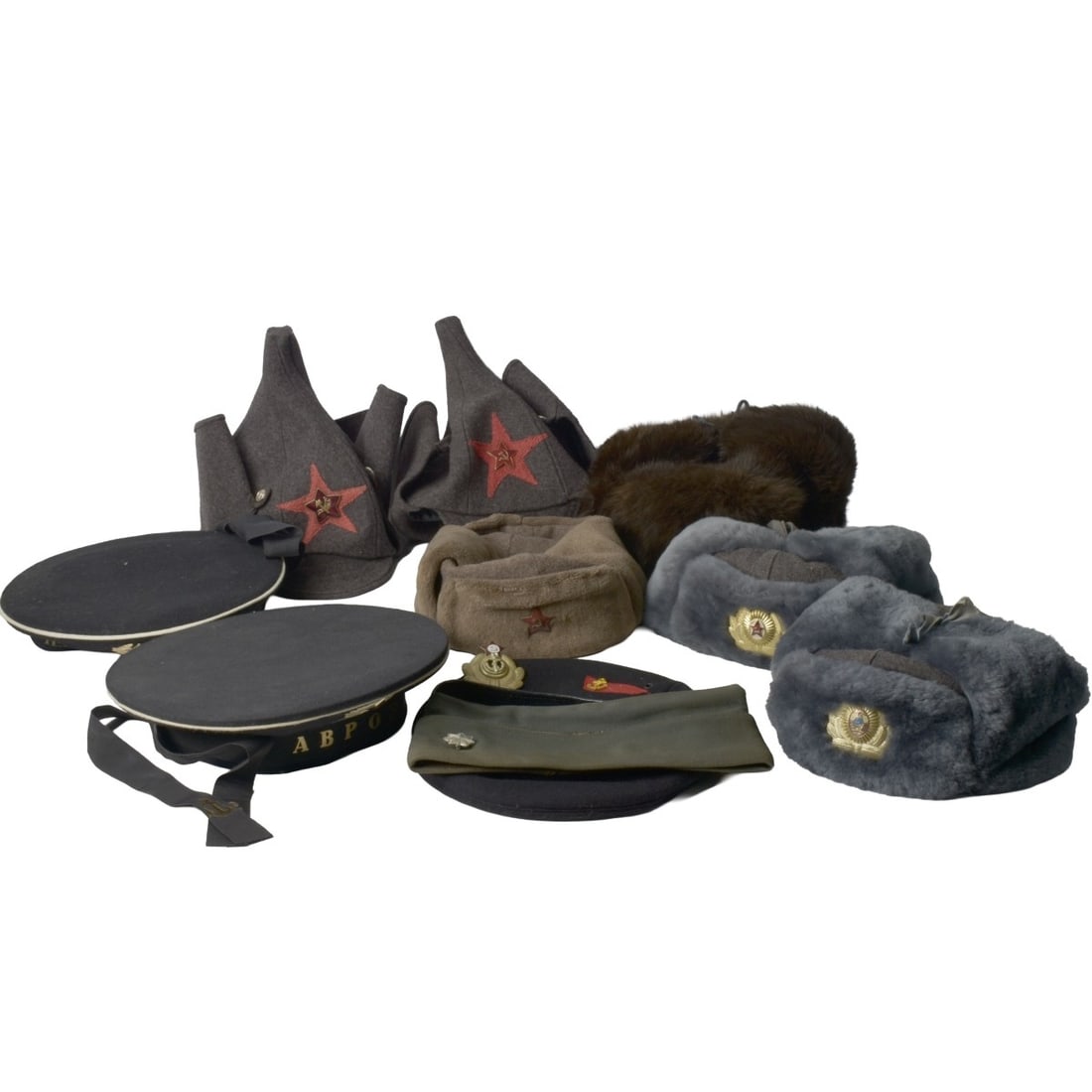 Russian Military Hats: Collection of Ten (10) Russian Military Hats. Various makers, sizes and materials. Kodner Galleries offers phone and absentee bidding at a low, flat 21% buyer?s premium without surcharge or hidden
