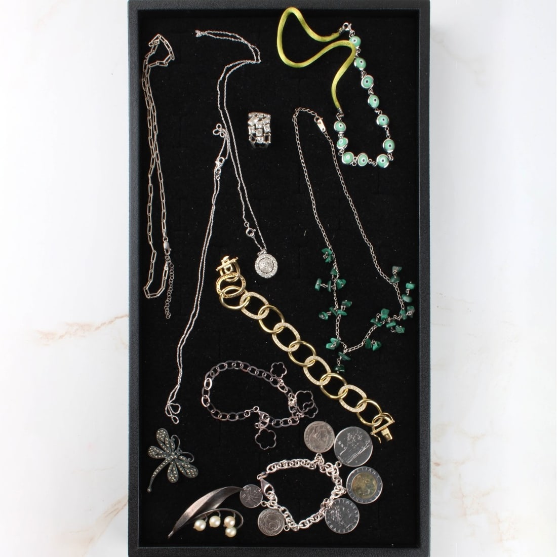 Sterling Silver Jewelry: Sterling Silver Jewelry. Consisting of six (6) necklaces, two (2) bracelets, one (1) ring, two (2) pins. Total gross weight of all pieces: 139 grams. Kodner Galleries offers phone and absentee