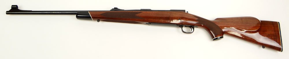 Circa 1970's Winchester New Haven, Connecticut Bolt: Circa 1970's Winchester New Haven, Connecticut Bolt Action Center Fire Rifle Model 70XTR 22" Barrel Number G 1465816. As New Unused Condition in Original Box with Paperwork. Box Measures 44 Inches Lon