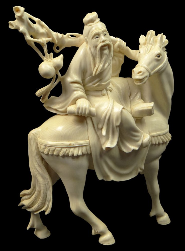 Mid 20th Century Chinese Carved Ivory Sage on Horseback: Mid 20th Century Chinese Carved Ivory Sage on Horseback Figure Group. Unsigned, Numbered to Hoof. Good Condition or Better. Measures 7-1/4 Inches Tall and 5-1/2 Inches Long. This item will only be shi