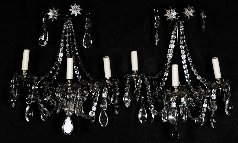 Pair of Early to Mid 20th Century Neo-classical style: Pair of Early to Mid 20th Century Neo-classical style Gilt Metal and Crystal Three Light Sconces. Unsigned. Missing a Few Crystal Drops Otherwise Good Condition. Measure Approximately 18 Inches Tall a