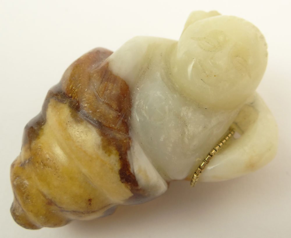 20th Century Chinese Carved Pale Celadon Jade with: 20th Century Chinese Carved Pale Celadon Jade with Russet Inclusions, Child Wrapped in Blanket. Unsigned. Good Condition or Better. Measures 2-1/4 Inches Long and 1-1/2 Inches Wide. Shipping $26.00
