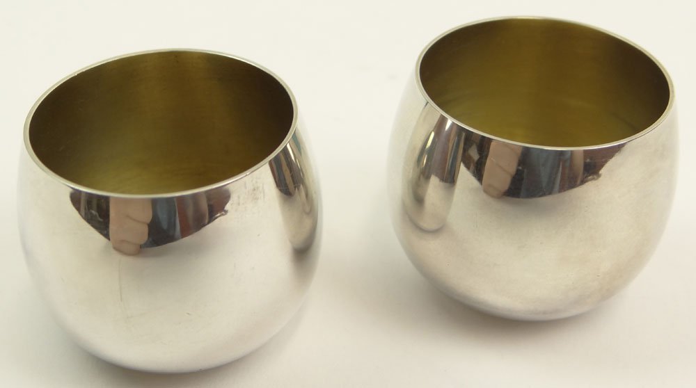 Two (2) Tiffany & Co Sterling Silver Miniature Cups or: Two (2) Tiffany & Co Sterling Silver Miniature Cups or Cordials with Gilt Washed Interiors and with Tiffany Cloth Bags and Tiffany Box. Signed. Good Condition or Better. Cup Measures 1-3/8 Inches Tall