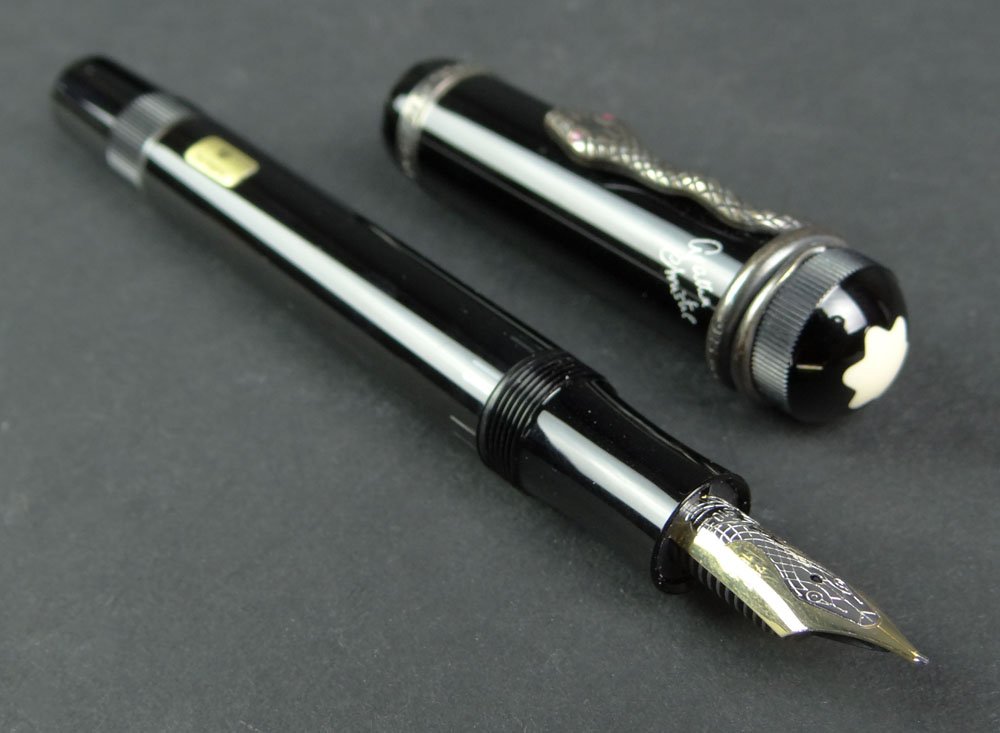 New in Box German Montblanc Meisterstuck Circa 1993: New in Box German Montblanc Meisterstuck Circa 1993 Handmade Limited Edition "Agatha Christie" Writers Series Black Resin Fountain Pen with Sterling Silver Snake Accented with Ruby Eyes and with 18 Ka