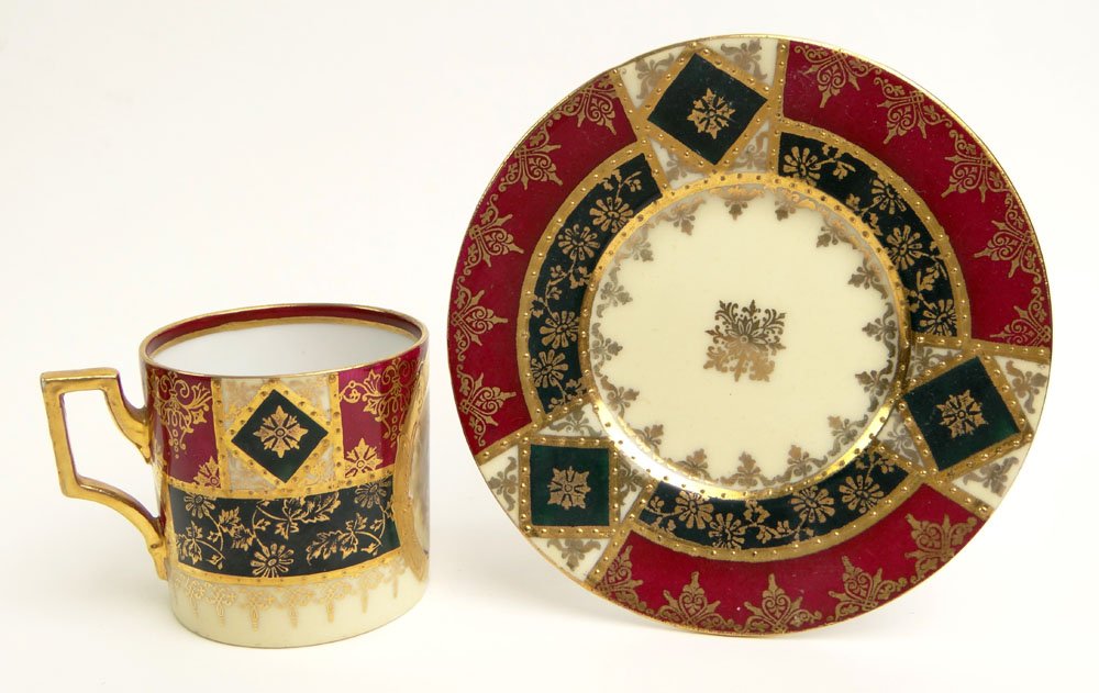 20th Century Royal Vienna Painted and Gilt Porcelain: 20th Century Royal Vienna Painted and Gilt Porcelain Cabinet Cup and Saucer with Raised Gilt Decoration. And with Wood Display Stand. Blue Beehive Mark to Base. Rubbing Otherwise Good Condition or Bet
