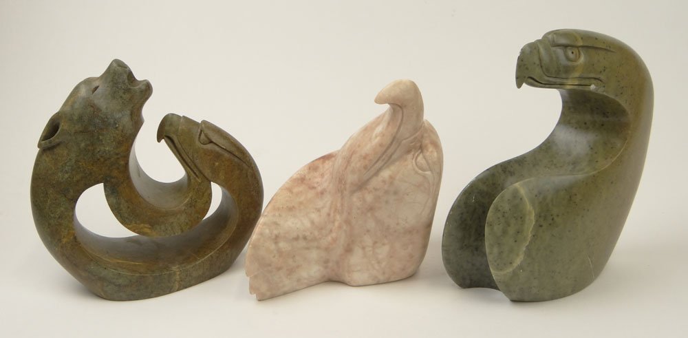 Three (3) Pacific Northwest Carved Soapstone Figures. 1: Three (3) Pacific Northwest Carved Soapstone Figures. 1 Eagle. Signed Willy Skye 07. 8-3/4 Inches Tall by 8-1/4 Inches Wide. 1 Eagle and Wolf. Signed Clifton Henry Six Nations Ont. Canada 08. Measures