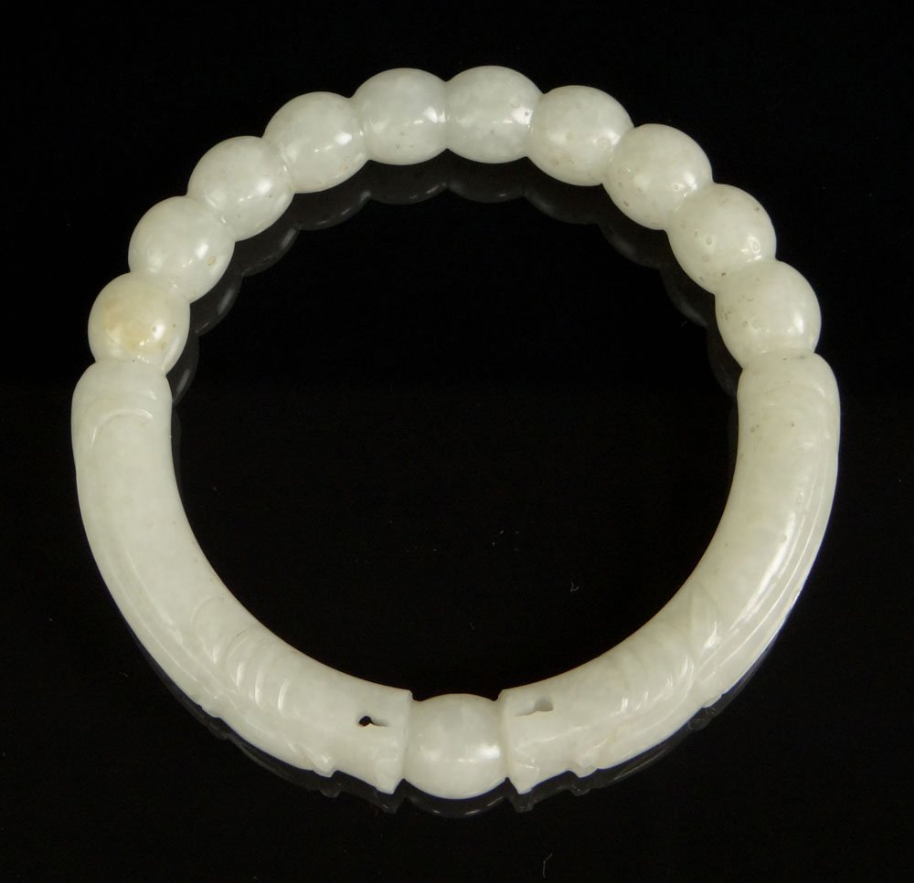Early 20th Century Chinese Carved White Jade Bangle: Early 20th Century Chinese Carved White Jade Bangle with Dragons. Unsigned. Good Condition or Better. Interior Diameter 2-1/4 Inches. Shipping $28.00