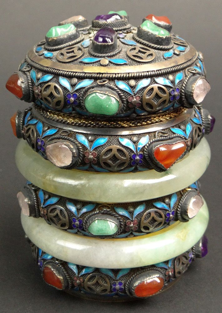 Chinese Silver Cylinder Shaped Box with Inlaid: Chinese Silver Cylinder Shaped Box with Inlaid Gemstones. Jade, Amethyst, Rose Quartz, Carnelian and Blue Enamel. Gold Washed Interior. Very Good Condition. Measures 4-1/4 Inches Tall by 3-1/4 Inches 