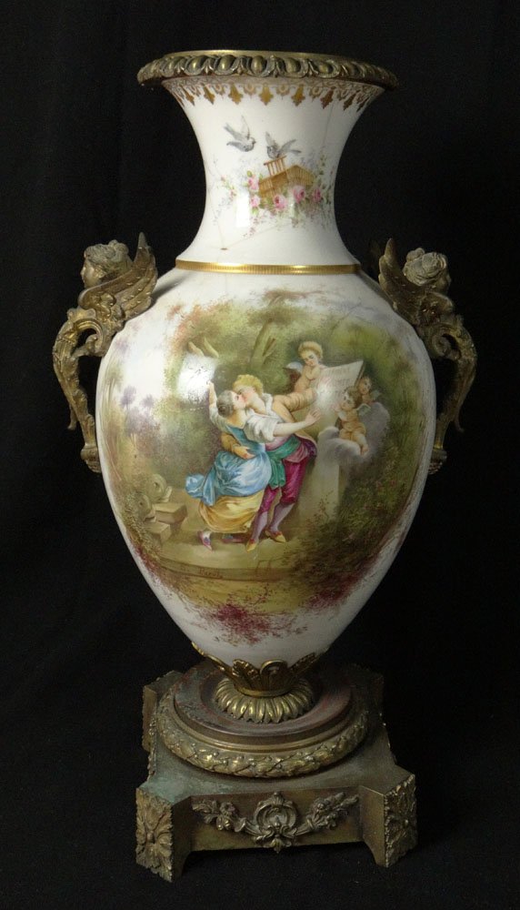 19th Century Hand Painted Sevres Porcelain Bronze: 19th Century Hand Painted Sevres Porcelain Bronze Mounted Urn with Front Panel Romantic Scene and Rear Panel Landscape with River. Artist Signed E. Parot. Large Spider Vein Hairline Extending Up to Ne