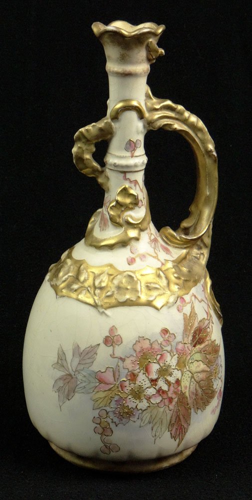 Early 20th Century German Royal Bonn Painted and Gilt: Early 20th Century German Royal Bonn Painted and Gilt Porcelain Ewer. Signed. Crazing to Glaze and Rubbing to Gilt Decoration Otherwise Good Condition. Measures 12-1/4 Inches Tall and 5-1/2 Inches Wid