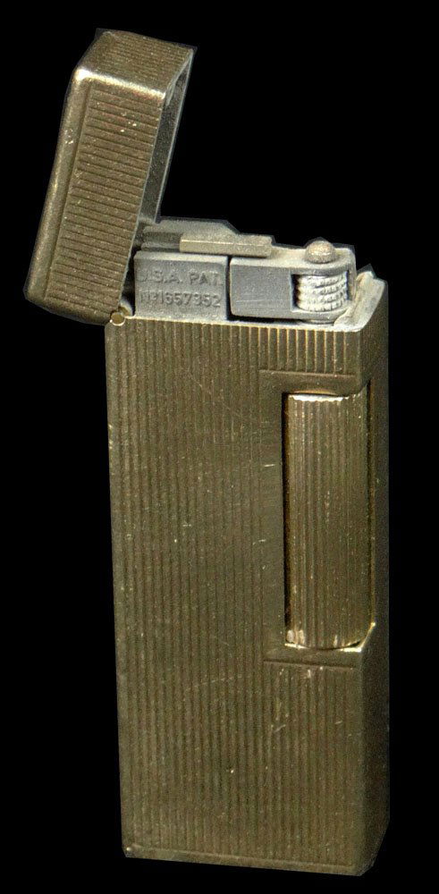 Vintage 14 Karat Yellow Gold Outer Jacket Dunhill: Vintage 14 Karat Yellow Gold Outer Jacket Dunhill Butane Cigarette Lighter with Engraved Comerford, Palm Beach. Signed Dunhill with 14K Gold Outer Jacket. Dent and Pings or else Good Condition. Not in