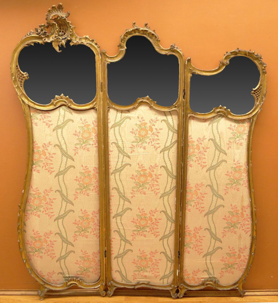 19th Century French Rococo Pierced Carved Gilt Wood: 19th Century French Rococo Pierced Carved Gilt Wood Three (3) Fold Dressing Screen with Mirrors of Graduating Sizes. Cartouche Shaped Crest Carved with Roses and C-Scrolls. Panels are Lined with Frenc