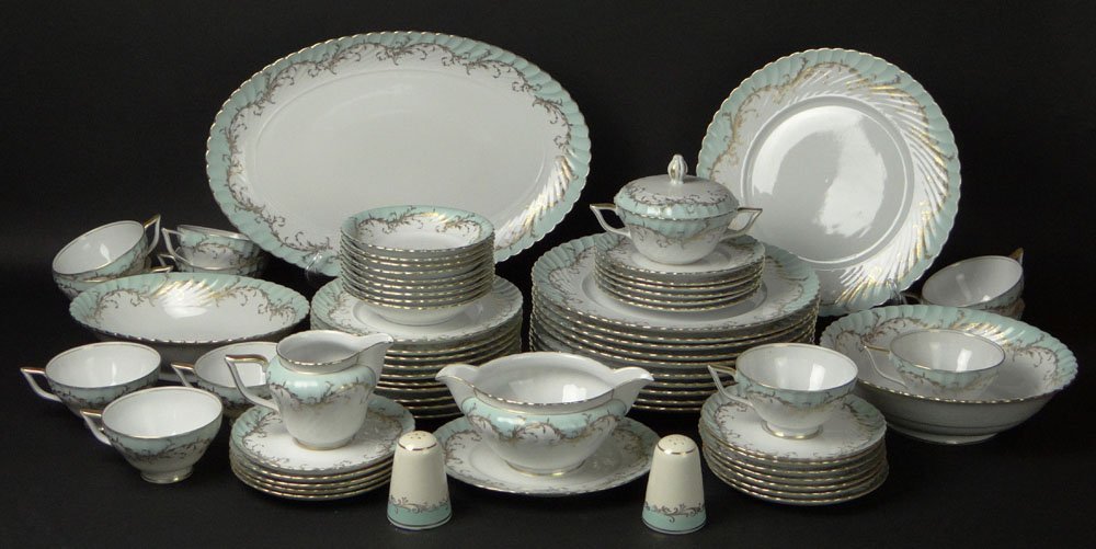 Sixty Five (65) Piece Royal Tettau Porcelain Dinner: Sixty Five (65) Piece Royal Tettau Porcelain Dinner Service in an Unknown Pattern. Service Includes: 11 Dinner Plates Measuring 10-5/8 Inches, 10 Salad Plates Measuring 7-3/4 Inches, 6 Bread Plates Me