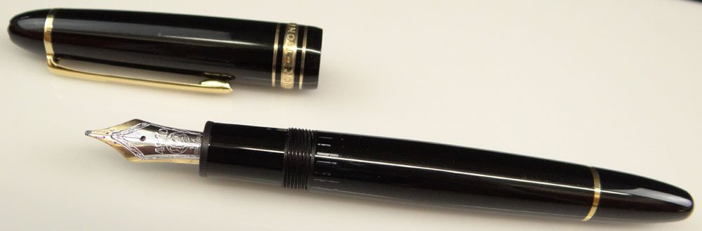 German Montblanc Meisterstuck Fountain Pen with 14: German Montblanc Meisterstuck Fountain Pen with 14 Karat Gold Nib #4810. Signed. Very Good Condition. No Box, No Paperwork. Measures 5 Inches Long without Cap and 5-3/4 Inches Long with Cap in Place. 