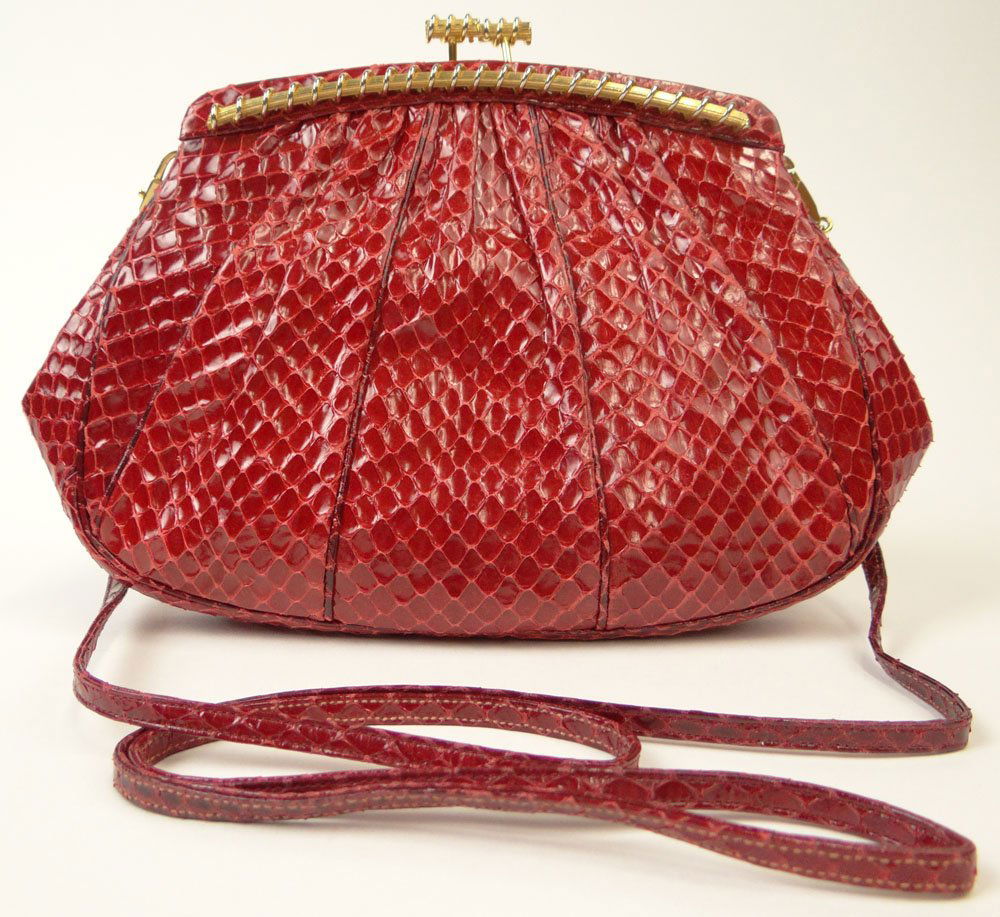 Judith Leiber Red Snakeskin Evening Bag with Gold and: Judith Leiber Red Snakeskin Evening Bag with Gold and Silver Clasp and Change Purse. Signed Judith Leiber and Copyright. Very Good Used Condition. Measures 6-1/24 Inches Tall and 9 Inches Long. Shippi
