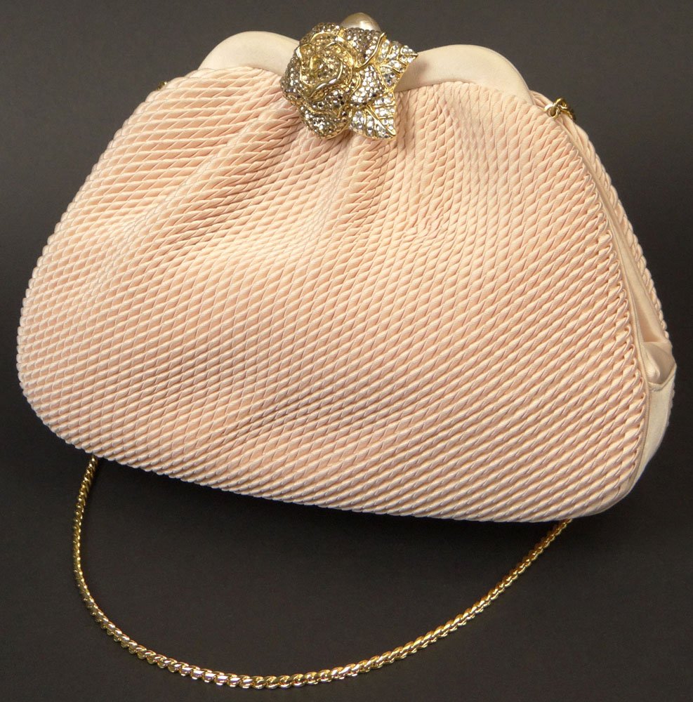 Pink Judith Leiber Crystal Evening Bag with Pearl: Pink Judith Leiber Crystal Evening Bag with Pearl Release. Signed Judith Leiber, Copyright and New York. Good to Very Good Condition. Measures 6-1/4 Inches Tall and 8-1/2 Inches Long. Shipping $36.00