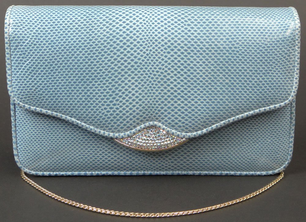 Blue Judith Leiber Snakeskin Evening Bag with Crystal: Blue Judith Leiber Snakeskin Evening Bag with Crystal Release. Signed Judith Leiber, Copyright and New York. Good to Very Good Condition. Measures 4 Inches Tall and 6-1/2 Inches Long. Shipping $36.00