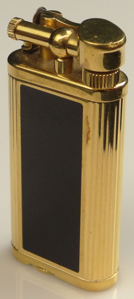 English Made Dunhill "Unique" Gold Tone and Lacquer: English Made Dunhill "Unique" Gold Tone and Lacquer Butane Lighter #WF426892. Signed Dunhill Unique Made in England and WF426892. Good to Very Good Used Condition. Lighter Measures 2-5/8 Inches Tall a