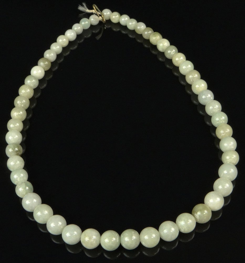 Chinese Carved Pale Celadon Jade Graduated Bead: Chinese Carved Pale Celadon Jade Graduated Bead Necklace. Unsigned. Lacking Part of Clasp Otherwise Good Condition or Better. Beads Range from 7mm to 10mm, Necklace Measures 17-1/2 Inches Long. Shippi