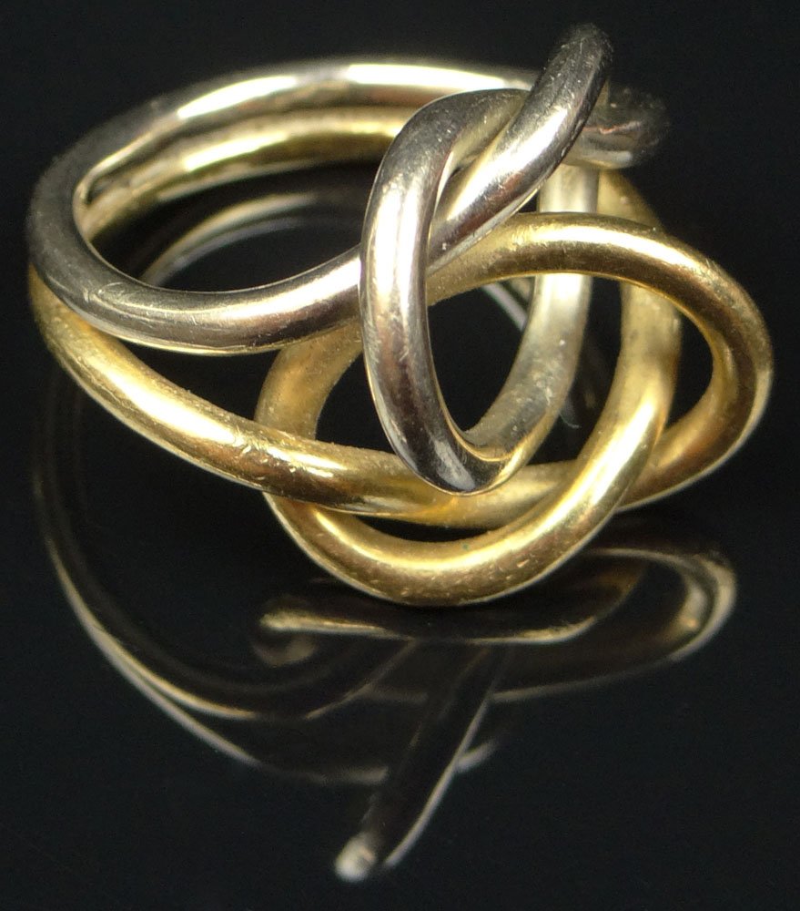 Vintage Italian Gucci 18 Karat Yellow and White Gold: Vintage Italian Gucci 18 Karat Yellow and White Gold Knot Ring. Signed. Minor Surface Wear from Normal Use Otherwise Good Condition. Ring Size 4. Approx. Weight: 6.20 Pennyweights. Shipping $26.00