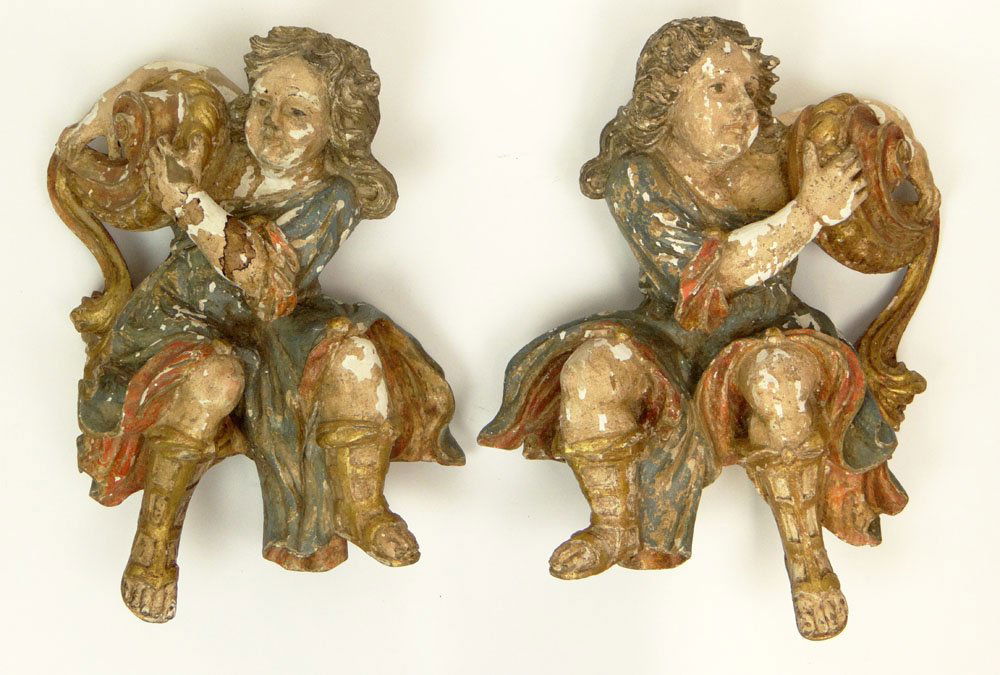 Pair of 18th Century Polychrome Painted Wall Hanging: Pair of 18th Century Polychrome Painted Wall Hanging Brackets with Carved Figural Seated Putti Playing Harps. Each Retains its Original Painted Surface. Surface Wear and Paint Loss Consistent with Age