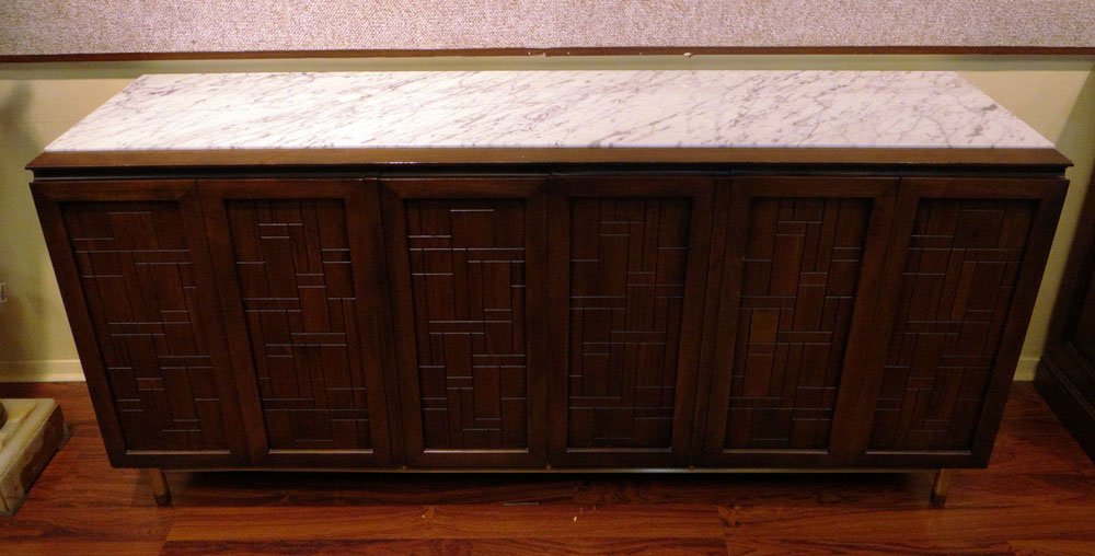 John Stuart Brass Mounted Walnut Sideboard Credenza: John Stuart Brass Mounted Walnut Sideboard Credenza with Two (2) Bi-Fold Center Doors, Interior Drawers and Marble Top. Signed Interior Drawer. Surface Wear but Overall Good Condition. Has a Hole for