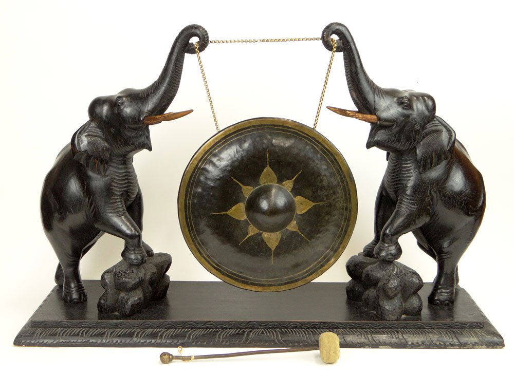 Early 20th Century Possibly Indian Carved Ebony and: Early 20th Century Possibly Indian Carved Ebony and Bronze Figural Elephant Gong. Unsigned. Rubbing Otherwise Good Condition or Better. Measures 20-7/8 Inches Tall and 32 Inches Long. Shipping $175.00