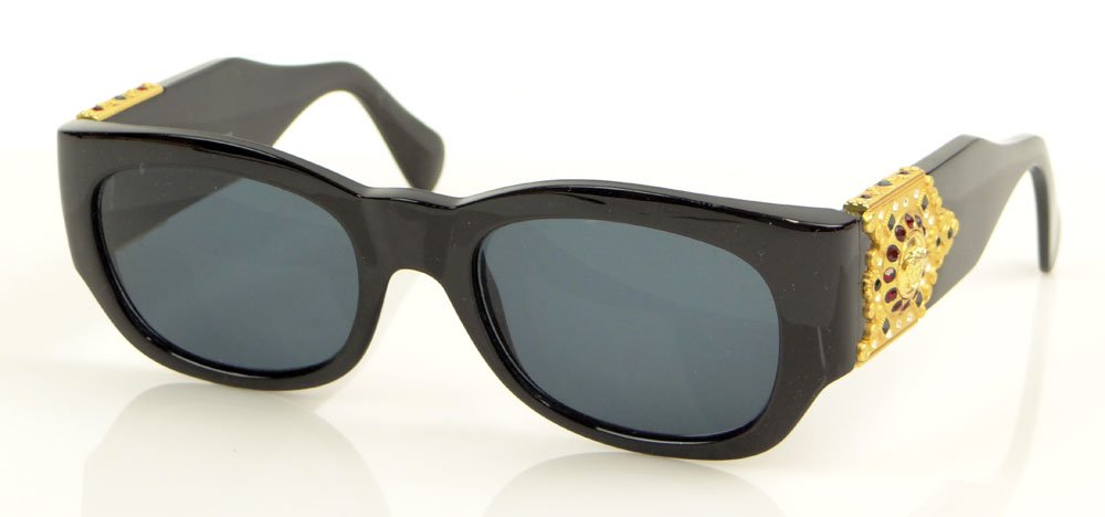 Vintage Lady's Italian Gianni Versace Sunglasses with: Vintage Lady's Italian Gianni Versace Sunglasses with Jeweled Medusa Head Ornaments and with Versace Case. Signed. Slight Wear from Normal Use Otherwise Good Condition. Case Measures 2-1/8 Inches Tall