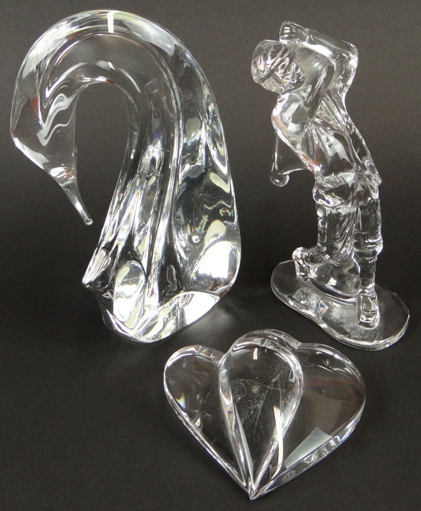 20th Century Daum France Crystal Swan Figure together: 20th Century Daum France Crystal Swan Figure together with a Baccarat Crystal Heart Figure and a Waterford Golfer Figure. All Signed. Minor Chip where the Heart comes to a Point or else others Good Co