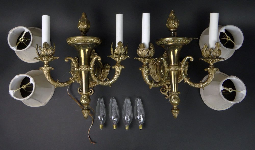 Pair of Early 20th Century Cast Metal Wall Sconces.: Pair of Early 20th Century Cast Metal Wall Sconces. Each with Two (2) Arms and Torchere Finials. Electrified. With Lampshades. Very Good Condition. Each Measures 13 Inches Tall by 11 Inches Wide. Ship