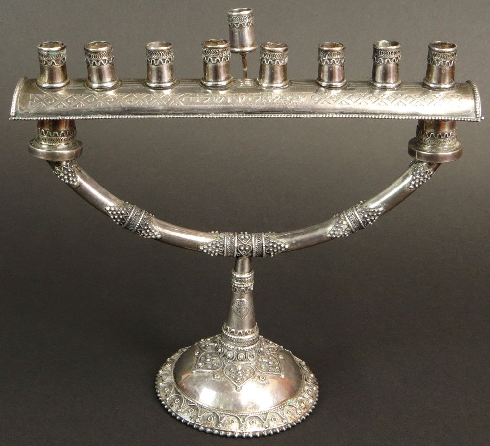 Early to Mid 20th Century Israeli Sterling Silver: Early to Mid 20th Century Israeli Sterling Silver Menorah. Signed in Hebrew in a couple of Places. Overall Good to Very Good Condition. Measures 7-3/8 Inches Tall to Top of Shamus and Measures 8 Inche
