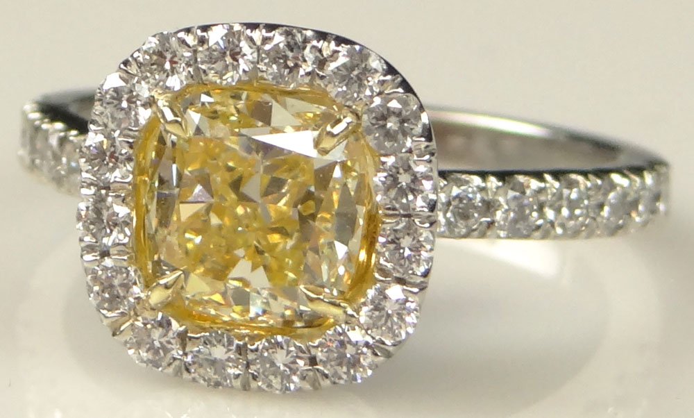Lady's Fine Quality 2.01 Carat Cushion Cut Fancy: Lady's Fine Quality 2.01 Carat Cushion Cut Fancy Intense Yellow Diamond, .70 Carat Round Brilliant Cut Diamond and Platinum Engagement Ring. Yellow Diamond VS Clarity, Round Diamonds E-F Color, VS Cla
