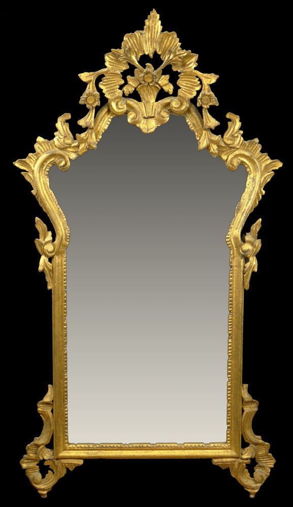 Vintage Italian Hand Carved Gilt Wood Mirror. Made In: Vintage Italian Hand Carved Gilt Wood Mirror. Made In Italy Label en verso. Some losses or in Otherwise Good Condition. Measures 40-1/2 Inches Tall and 22-1/2 Inches Wide. We will not ship this item d