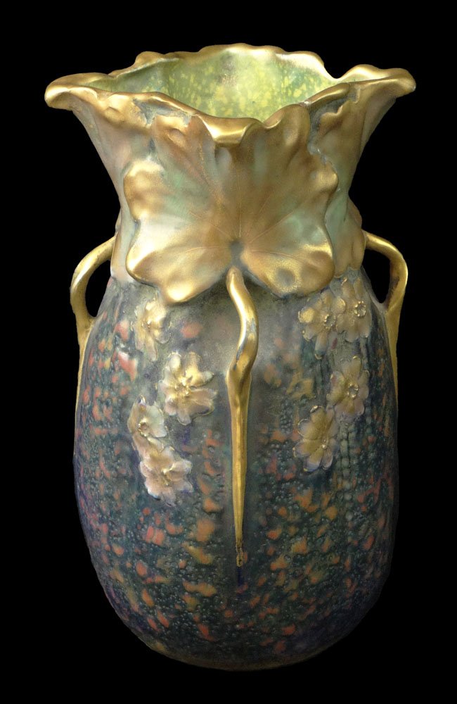 Circa 1890 Amphora Austria Vase with 4 Handles.: Circa 1890 Amphora Austria Vase with 4 Handles. Decorated with Leaves and Flowers. Impressed Mark Amphora Austria with Crown. Numbered 3860. Hairline Crack to the Base Otherwise in Good Condition. Mea