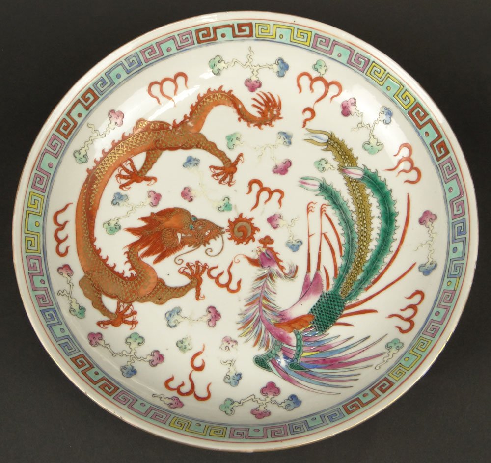 Chinese Guangxu (1875-1908) Famille Rose Porcelain: Chinese Guangxu (1875-1908) Famille Rose Porcelain Shallow Bowl with Dragon and Phoenix Bird Decoration. Six Character Mark to Base. Flakes and Rubbing to Rim Otherwise Good Condition. Measures 1-7/8 