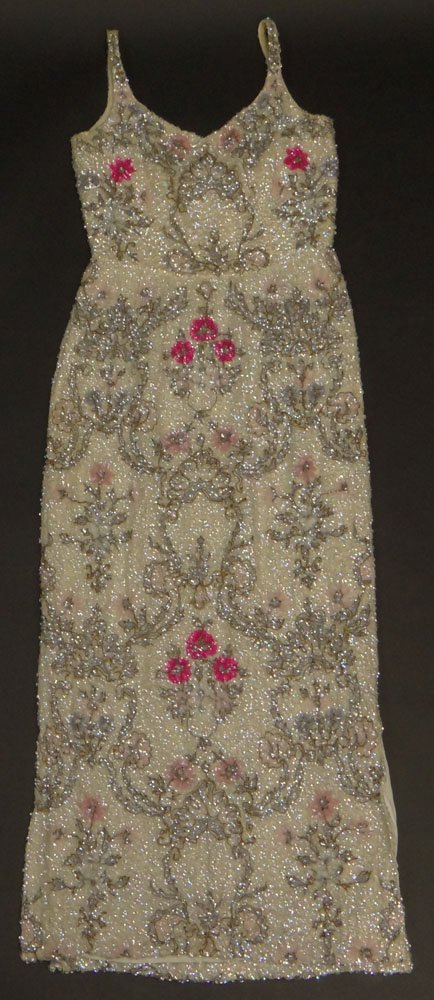 Vintage Sequined Evening Gown. Silk Lined, Split Sides.: Vintage Sequined Evening Gown. Silk Lined, Split Sides. Zipper Closure. No Label. Good Vintage Condition. This Garment has no Size Tag, Please Note The Measurements: 47 Inches From Neckline to Hem, 30