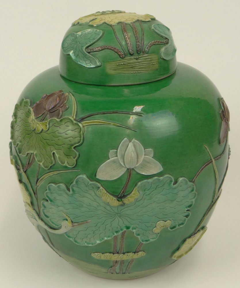 Large 20th Century Chinese Porcelain Ginger Jar.: Large 20th Century Chinese Porcelain Ginger Jar. Features a Raised Relief Motif of Lotus and Cranes on a Green Ground. Signed on Bottom With Impressed Character Marks. Good to Very Good Condition. Mea