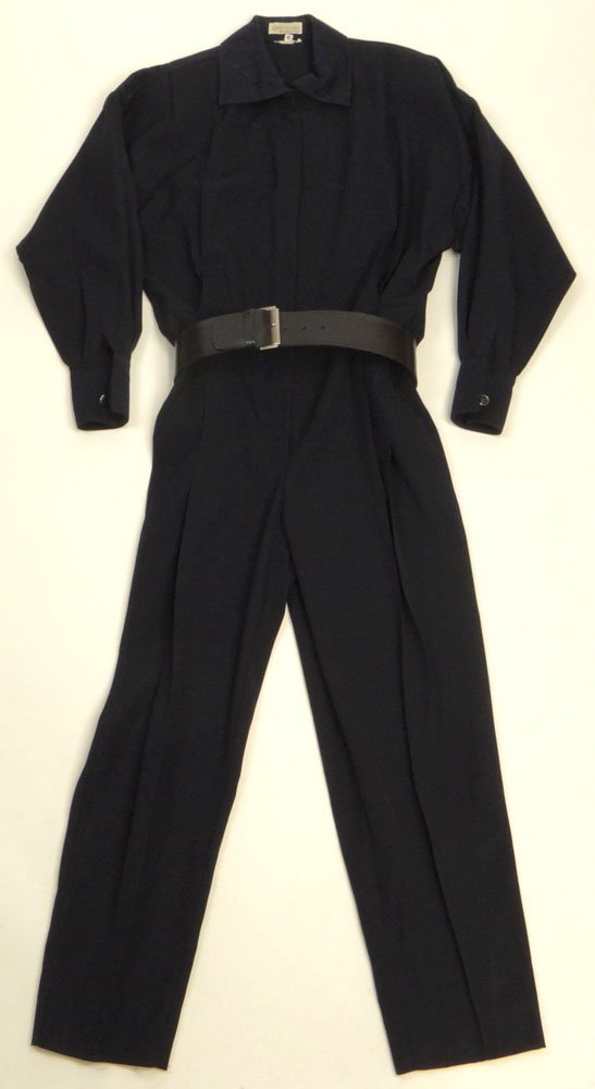 Retro Gianni Versace Made In Italy Inverted Pleated: Retro Gianni Versace Made In Italy Inverted Pleated Wool Jumpsuit With Leather Belt. Zipper Closure, Padded Shoulders. Navy Color. Size 6. Good Condition. Shipping $35.00