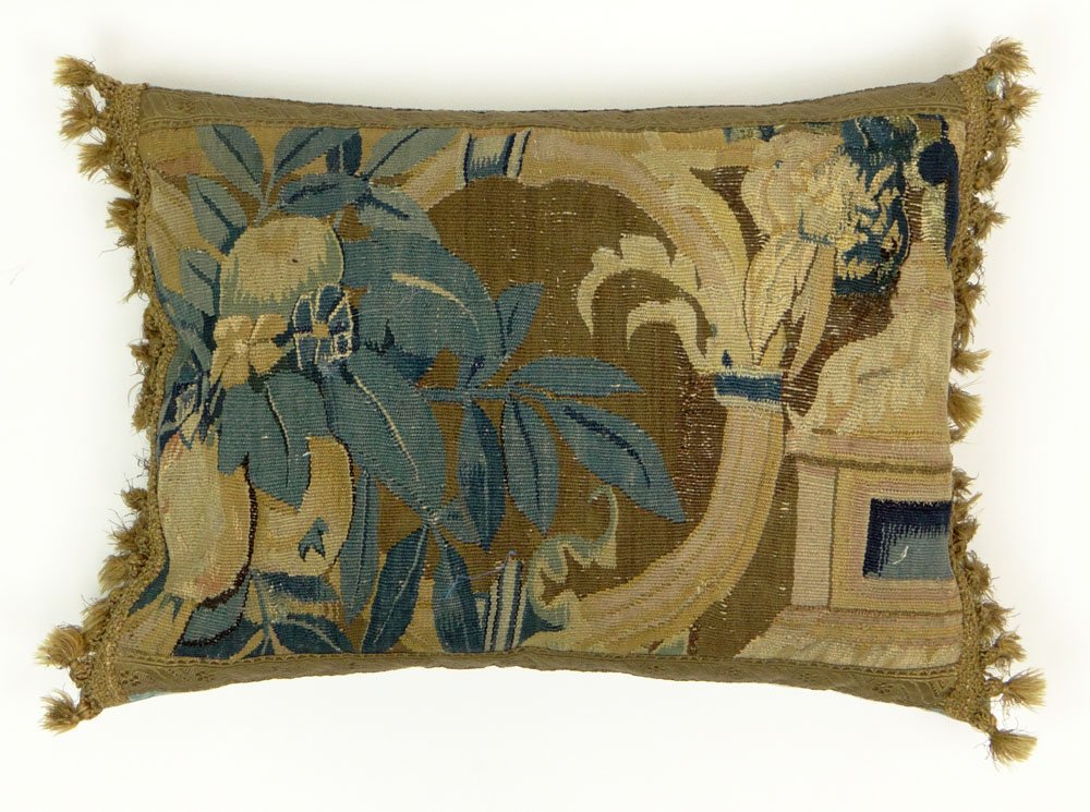 18th Century Continental Tapestry-Faced Aubusson: 18th Century Continental Tapestry-Faced Aubusson Pillow. Beige Ground with a Building and Floral Motif in Blue, Brown and Beige, Trimmed with Gold Fringe and Tassels. Surface Wear Consistent with Age 