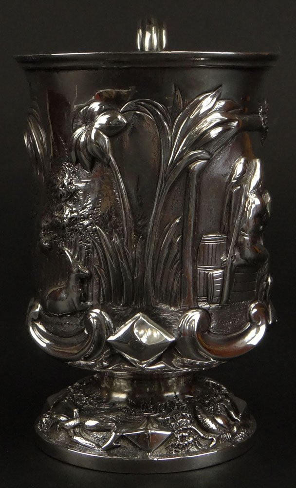 19th Century English Silver Loving Cup. Detailed: 19th Century English Silver Loving Cup. Detailed Figural Tavern Scene Motif. Inscribed. Signed with London Hallmarks, 1854. Makers Mark WRS. Good Condition. Measures 5 Inches Tall and Weighs 7.48 Troy