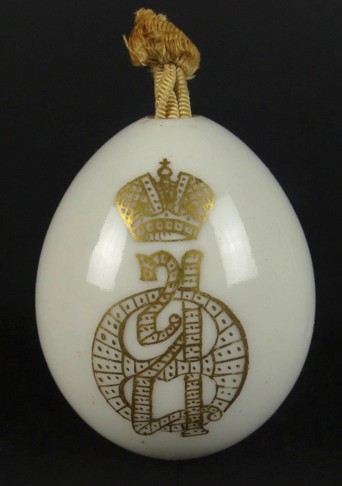 Circa 1914-1917 Russian Imperial Porcelain Presentation: Circa 1914-1917 Russian Imperial Porcelain Presentation Easter Egg with the Cipher of the Empress Alexandra Feodorovna, the Imperial Crown and Red Cross en verso. Good Condition or Better. Measures 2-