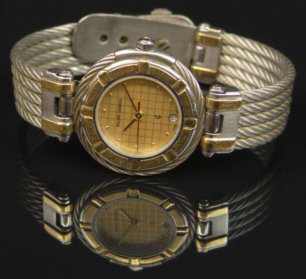 Vintage Phillippe Charriol Celtic Cable Ladies Watch.: Vintage Phillippe Charriol Celtic Cable Ladies Watch. Gold Face with Two Tone Cable Bracelet. Signed on Face as Well as On Back of Case: Phillippe Charriol (Logo) Swiss Quartz Water Resistant. Not in