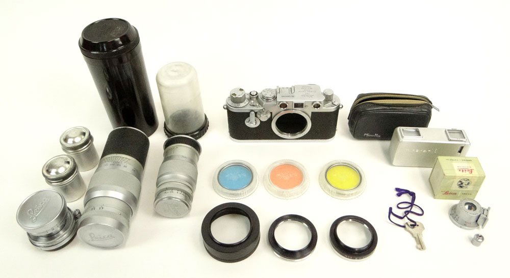 Circa 1950's Leica DRP Ernst Leitz Wetzlar Germany: Circa 1950's Leica DRP Ernst Leitz Wetzlar Germany Camera Nr. 698 688 with Three (3) Lenses: Leica M Mount Elmar 1:4/90mm; Leica 135mm f/4.5; Leica 50mm f/2 in Fitted Aluminum Case with Additional Acc